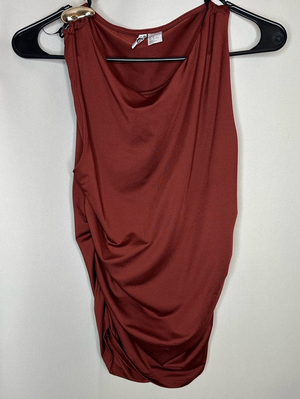Draped top with gold accent